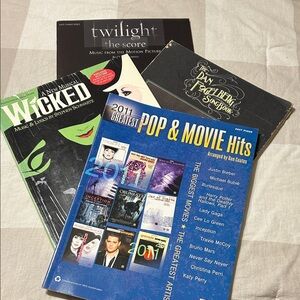 Four piano/vocal Music Books